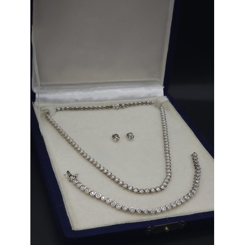 26 - An Absolutely Stunning 18K White Gold and Diamond Tennis Necklace, Bracelet and Earring Set. 7ctw of... 