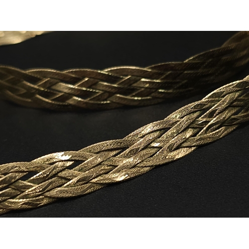 412 - A 9K GOLD INTERWOVEN NECKLACE .  6.4gms   40cms