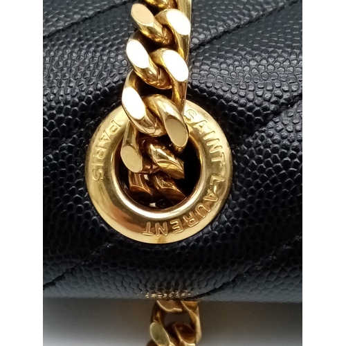 584 - The Saint Laurent YSL Large Envelope Chain Flap Bag is a sophisticated choice in black Grain de Poud... 