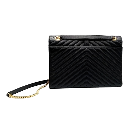 584 - The Saint Laurent YSL Large Envelope Chain Flap Bag is a sophisticated choice in black Grain de Poud... 