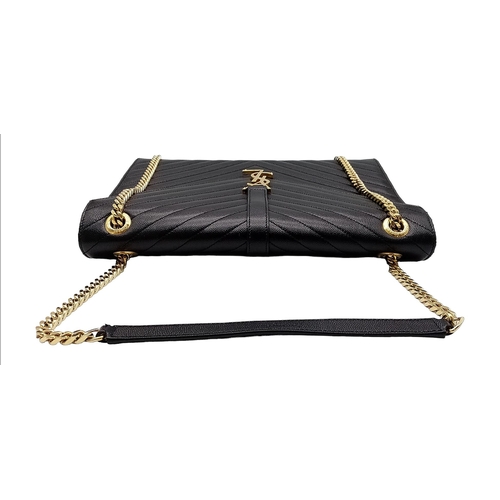 584 - The Saint Laurent YSL Large Envelope Chain Flap Bag is a sophisticated choice in black Grain de Poud... 