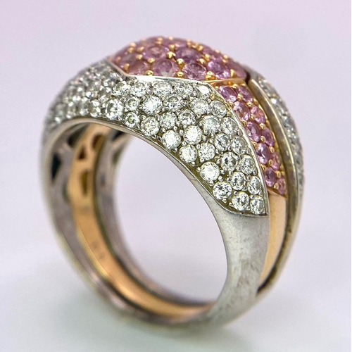 697 - An Ultra-Glamourous 18K White and Yellow Gold Diamond and Pink Stone Heart Ring. A central pink ston... 