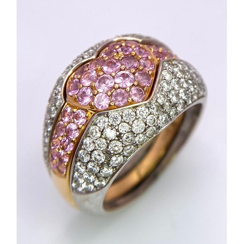 697 - An Ultra-Glamourous 18K White and Yellow Gold Diamond and Pink Stone Heart Ring. A central pink ston... 