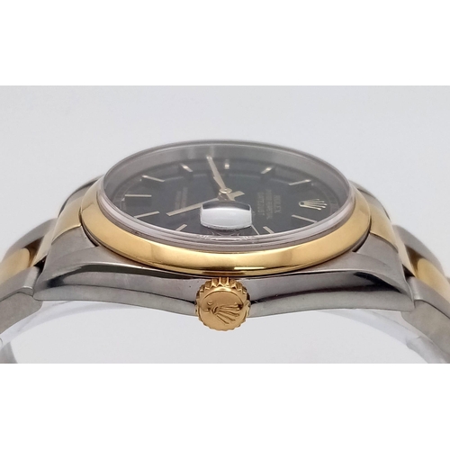 142 - A Rolex Oyster Perpetual Datejust Bi-Metal Gents Watch. 18K gold and stainless steel bracelet and ca... 