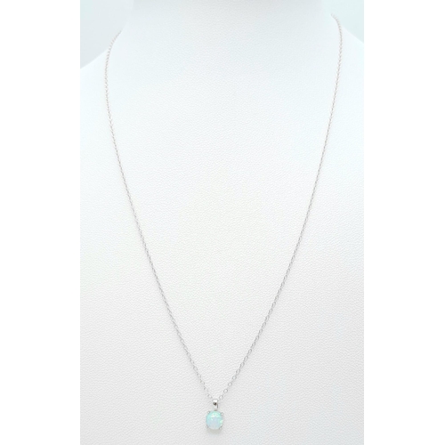 1468 - Collection of Sterling Silver, Opal Jewellery.
Opal pendant Necklace, 46cm in length and a pair of h... 