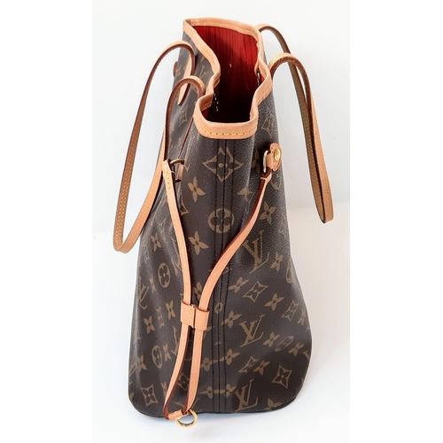 590 - The Louis Vuitton Monogram Canvas Neverfull GM is a dual-purpose accessory, serving as both a sleek ... 