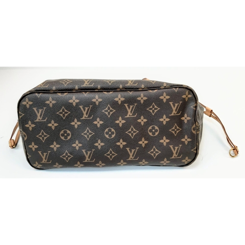 590 - The Louis Vuitton Monogram Canvas Neverfull GM is a dual-purpose accessory, serving as both a sleek ... 