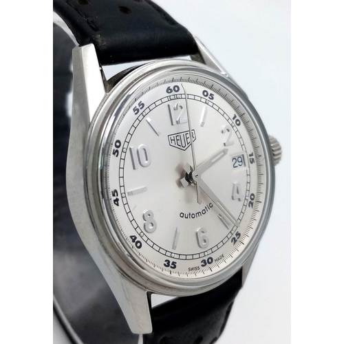 608 - A HEUER GENTS AUTOMATIC WATCH IN STAINLESS STEEL AND ON THE ORIGINAL HEUER LEATHER STRAP .   36mm