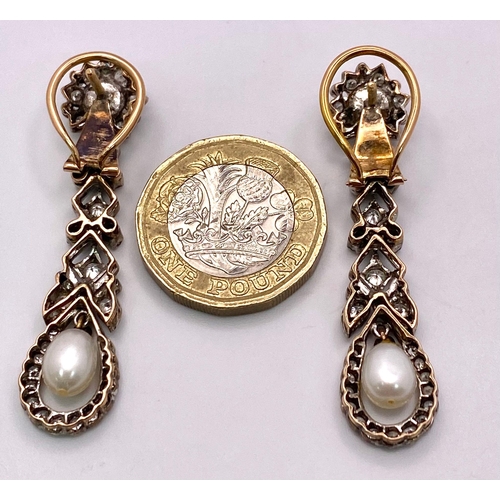 706 - A Pair of 14K Yellow Gold, Diamond and Pearl Art Deco Drop Earrings. Beautifully crafted with bright... 