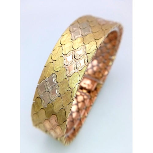 92 - An Italian 18K Gold Tri-Colour Bracelet. An incredible piece of craftmanship with diamond mesh patte... 