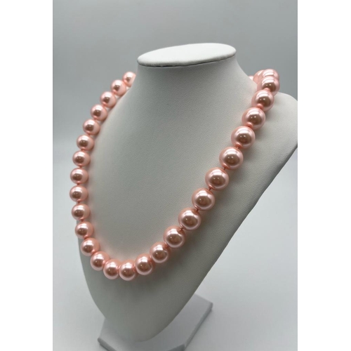 1235 - A Vivacious Pink South Sea Pearl Shell Necklace. 14mm statement beads. Necklace length - 48cm.