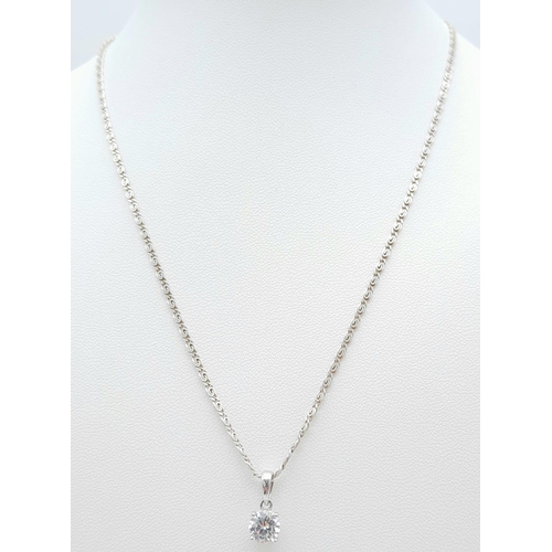 1288 - A 925 Silver Necklace with a dazzling white stone pendant.
Length: 46cm
Weight: 4.63g