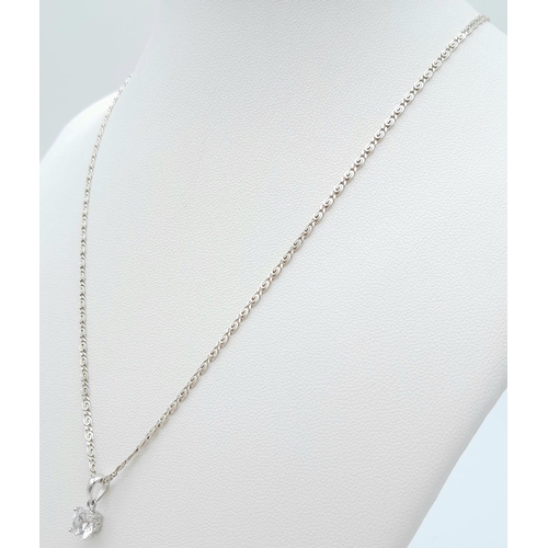 1288 - A 925 Silver Necklace with a dazzling white stone pendant.
Length: 46cm
Weight: 4.63g