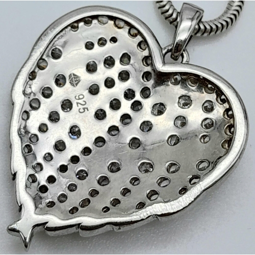 1309 - A 925 Silver Necklace with a Love Heart Pendant.
Measures 44cm in length.
Weight: 8.05g