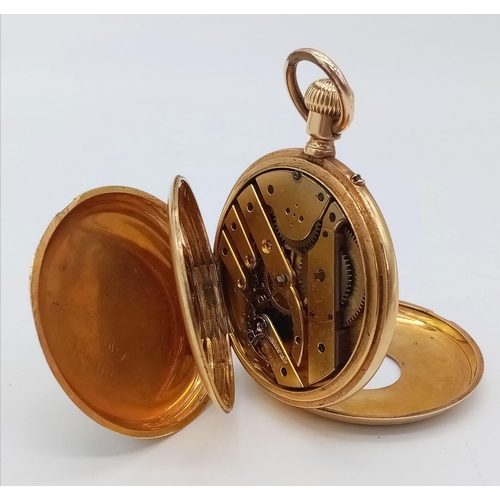 1445 - An Antique Gold Plated Half Hunter Pocket Watch. Top winder. White dial with second sub dial. In wor... 