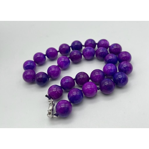 1606 - A Charming Purple Sugilite Large Bead Gemstone Necklace. 
Beads - 14mm. Necklace length - 42cm.