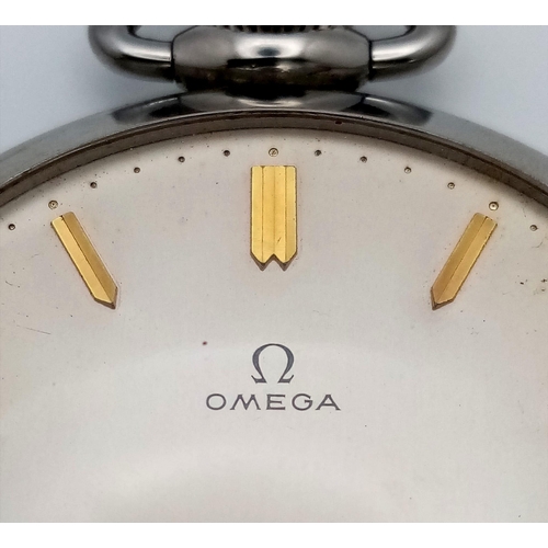 615 - A VINTAGE TOP WINDING OMEGA POCKET WATCH WITH GOLD HANDS AND NUMERALS IN EXCELLENT CONDITION .  50mm