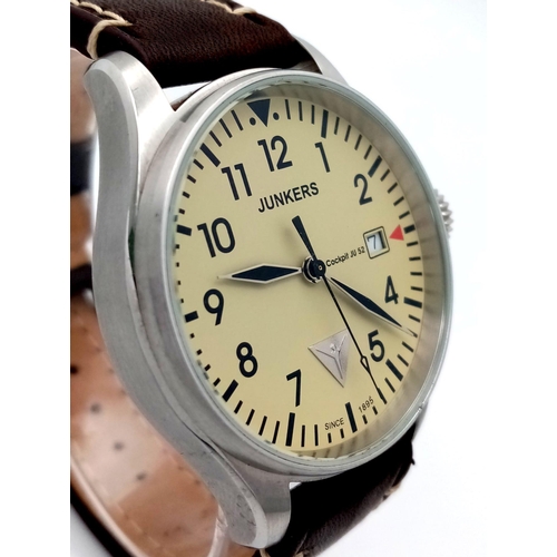 955 - A German Junkers Cockpit Quartz Gents Watch. Brown leather strap. Stainless steel case - 40mm. Beige... 