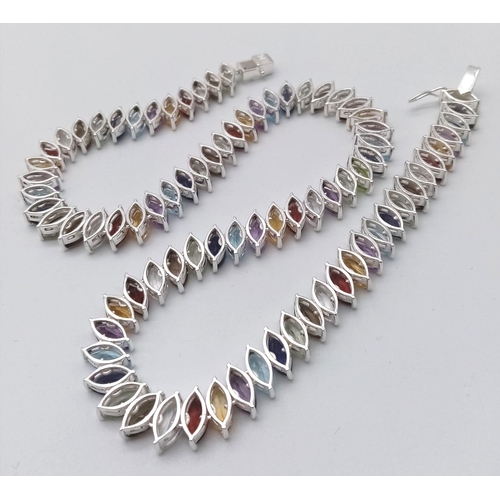 1267 - A dazzling Marquise Cut Gemstone Tennis Necklace set in 925 Silver. Featuring a wide variety of gems... 