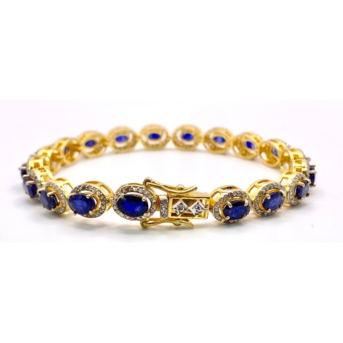 1351 - A stunning Oval-cut, Blue Sapphire,  Gold gilded Sterling Silver, Tennis Bracelet with Diamond accen... 