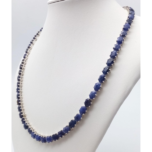 1365 - A classy Oval-cut Blue Sapphire gemstone, Sterling Silver, Long Necklace. Measures 47cm in length an... 