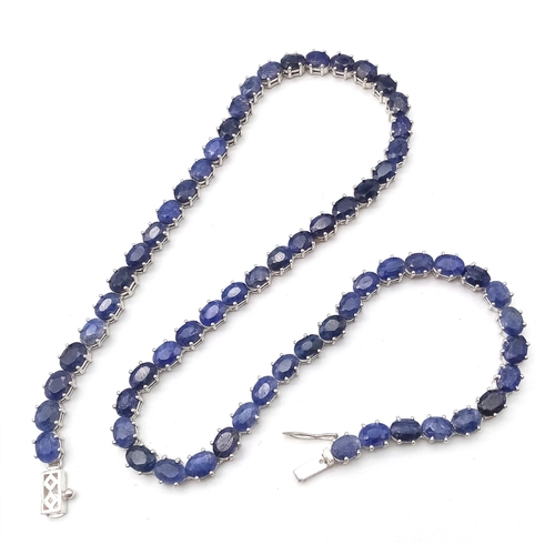 1365 - A classy Oval-cut Blue Sapphire gemstone, Sterling Silver, Long Necklace. Measures 47cm in length an... 