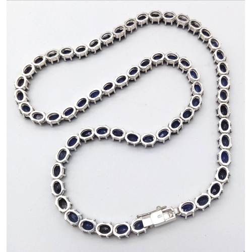 1365 - A classy Oval-cut Blue Sapphire gemstone, Sterling Silver, Long Necklace. Measures 47cm in length an... 