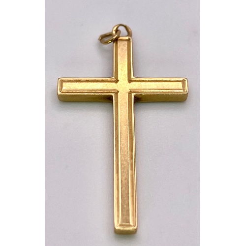 1407 - A 9K Yellow Gold Cross Pendant. 2.5cm x 1.5cm. 1.88g weight.