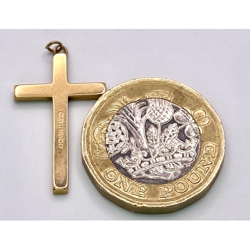 1407 - A 9K Yellow Gold Cross Pendant. 2.5cm x 1.5cm. 1.88g weight.