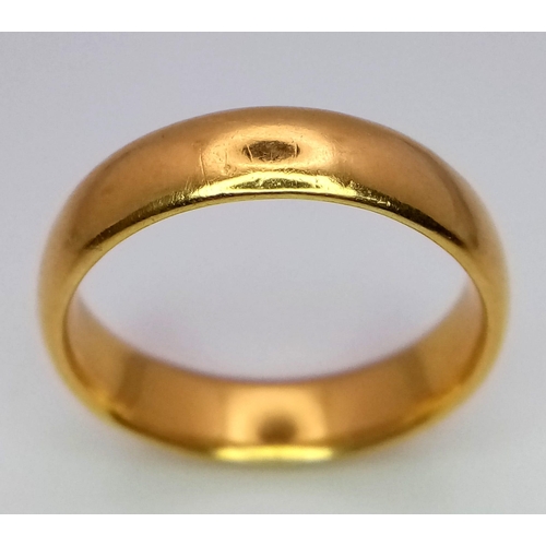 1603 - A Vintage 22k Yellow Gold Band Ring. 5mm width. Full UK hallmarks. Size R. 8.3g weight.