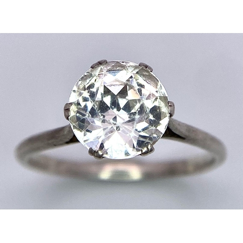 1615 - 2X silver Cubic Zirconia solitaire rings. Total weight 3.5G. Size: M and K.