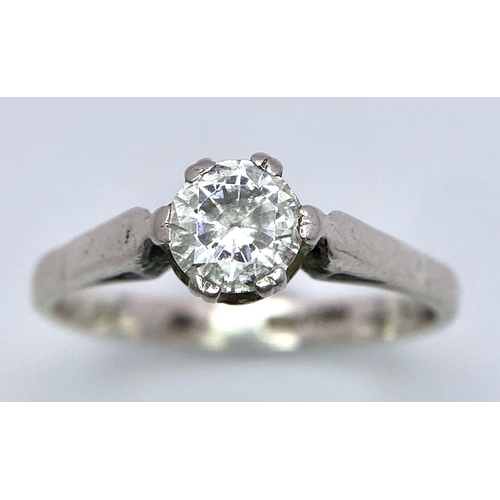 1615 - 2X silver Cubic Zirconia solitaire rings. Total weight 3.5G. Size: M and K.