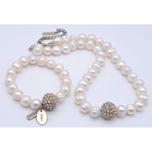 2004 - A Cultured Pearl Necklace and Bracelet Set with Glitterball Decoration. Necklace - 40cm. Bracelet - ... 