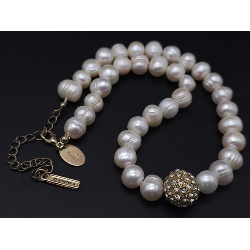 2004 - A Cultured Pearl Necklace and Bracelet Set with Glitterball Decoration. Necklace - 40cm. Bracelet - ... 