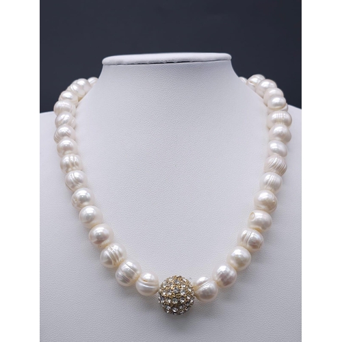 2004 - A Cultured Pearl Necklace and Bracelet Set with Glitterball Decoration. Necklace - 40cm. Bracelet - ... 