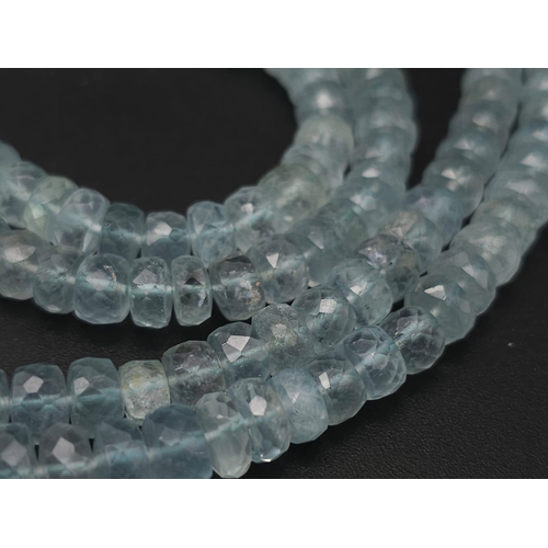 1435 - An iridescent, double row Aquamarine Gemstone Necklace with a 925 Silver clasp.
Total weight: 50.23g... 