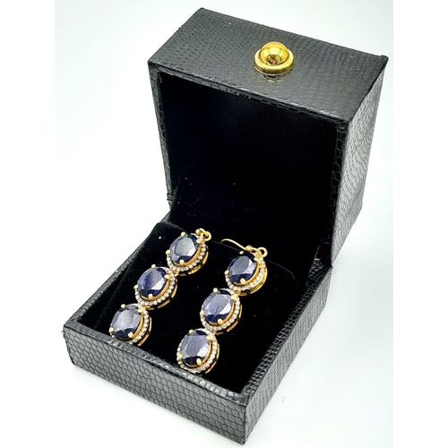 1470 - A delightful pair of Blue Sapphire & Diamond, Gold gilded Sterling Silver, Pendulous Earrings.
12cts... 