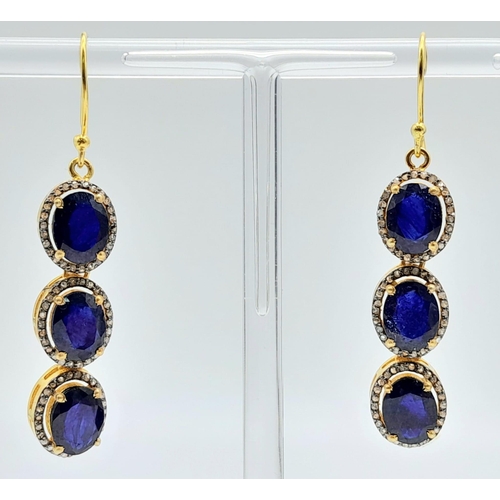 1470 - A delightful pair of Blue Sapphire & Diamond, Gold gilded Sterling Silver, Pendulous Earrings.
12cts... 