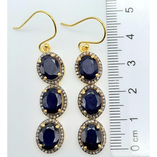 1470 - A delightful pair of Blue Sapphire & Diamond, Gold gilded Sterling Silver, Pendulous Earrings.
12cts... 