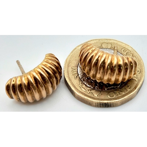 1703 - A Pair of 9K Yellow Gold Decorative Shell Earrings. No backs. 
2.83g total weight.