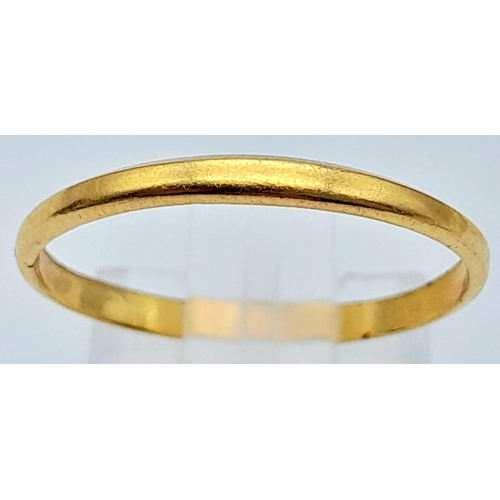 1704 - A Very Thin 22K Yellow Gold Band Ring. Size L/M. 1.26g weight.