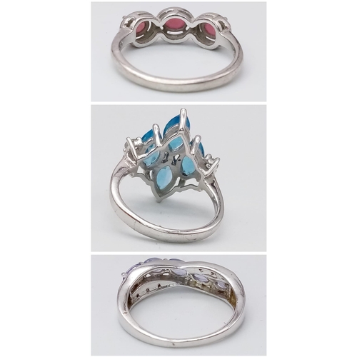 1711 - Three 925 Silver Gemstone Rings: Amethyst - R, Aquamarine - P and Ruby - P. 11.28g total weight.