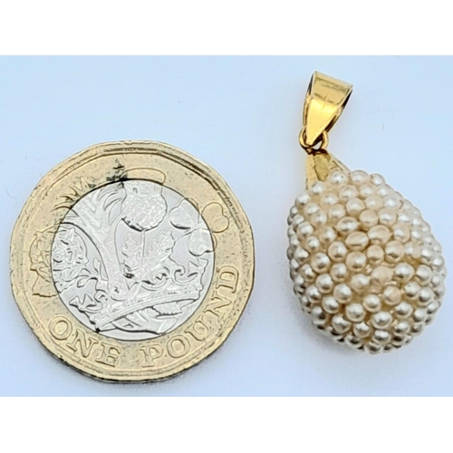 2003 - A Seed Pearl and Gold Bail Pendant. 3cm. 4.45g total weight.