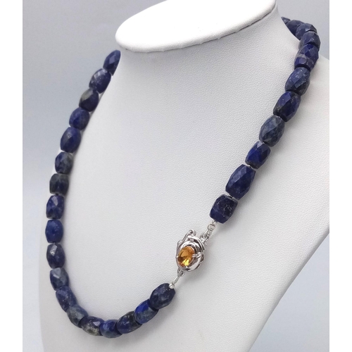 1727 - A delightful Drum-Cut, Lapis Lazuli Necklace with a Citrine, 925 Silver clasp. This stylish necklace... 