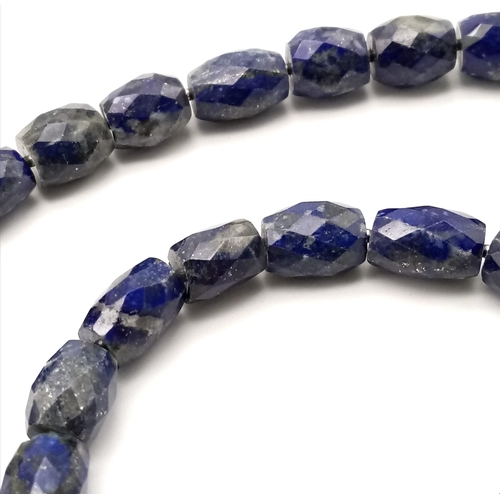 1727 - A delightful Drum-Cut, Lapis Lazuli Necklace with a Citrine, 925 Silver clasp. This stylish necklace... 