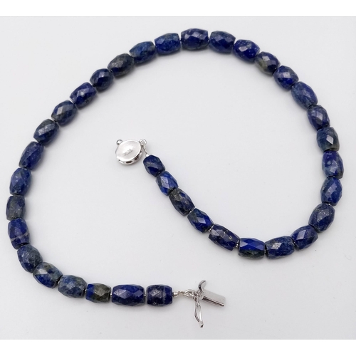 1727 - A delightful Drum-Cut, Lapis Lazuli Necklace with a Citrine, 925 Silver clasp. This stylish necklace... 