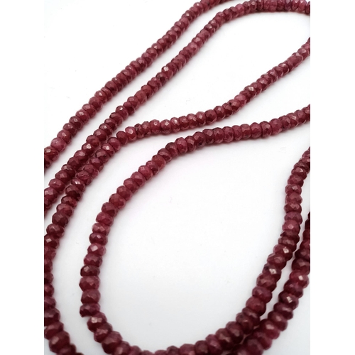 1734 - Sure to grab attention, this gorgeous double row Ruby beaded necklace with 925 Silver clasp makes a ... 