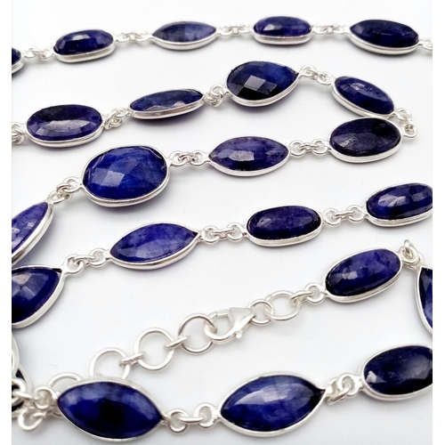 1741 - A stylish Blue Sapphire long chain necklace, set in Sterling Silver. This classic necklace measures ... 