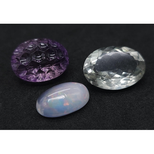 2891 - Three Certificated Gemstones: 9.59ct amethyst, 3.43ct Ethiopian opal and a 7.92ct light green prasio... 