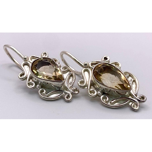 2898 - A Pair of Citrine, 925 Sterling Silver Drop Earrings. 9ctw. Drop - 2.5cm. Comes with a presentation ... 